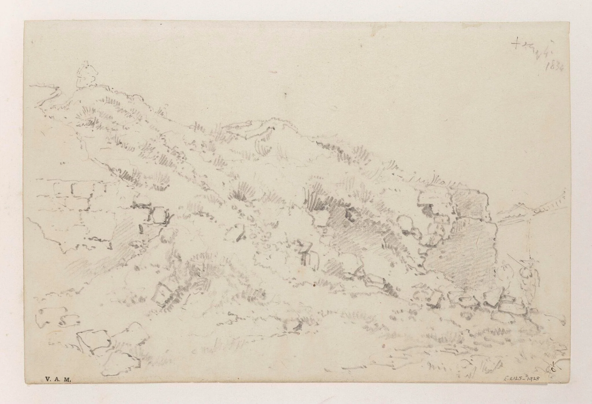 A hillside with ruined masonry