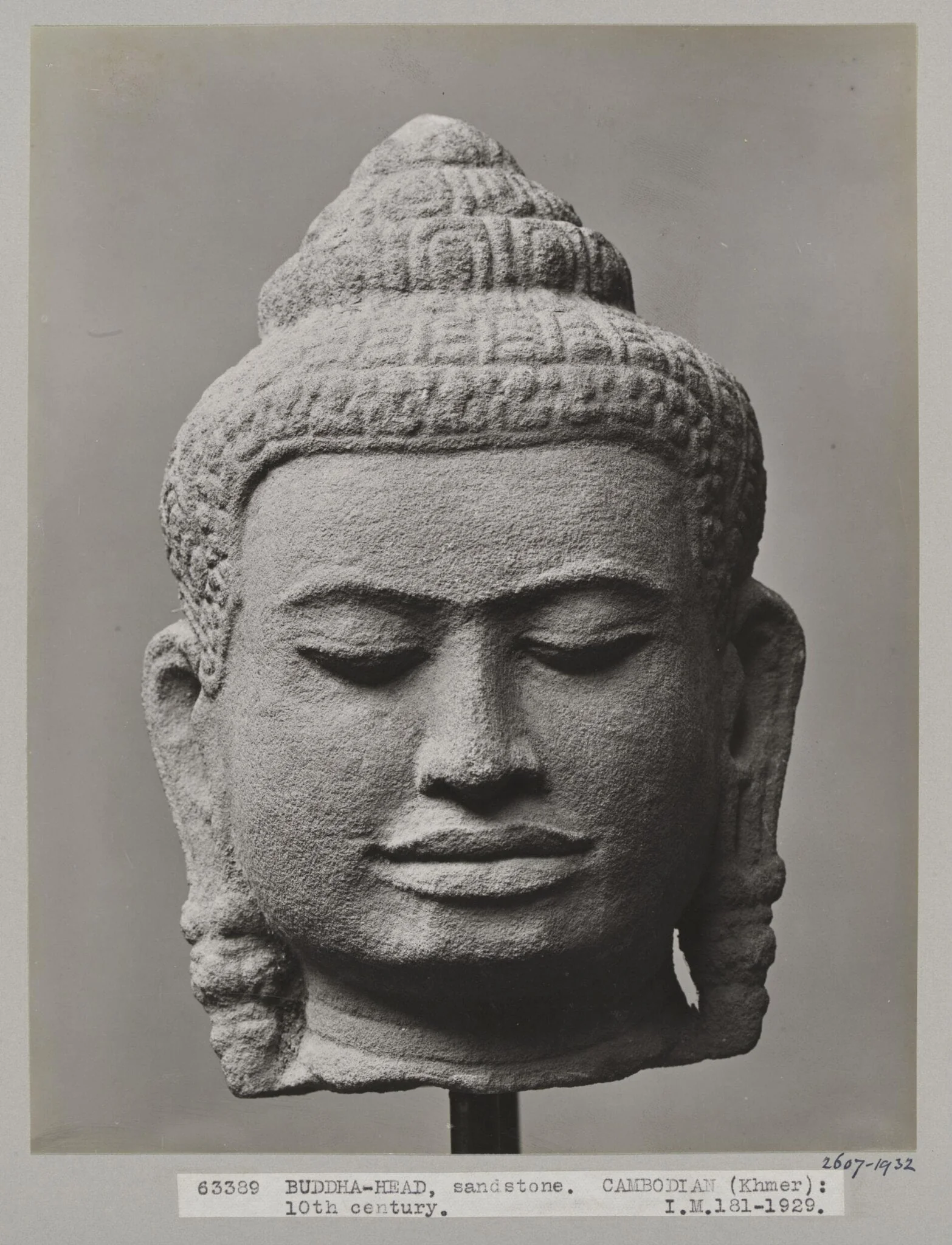 Cambodian Bayon style sandstone sculpture of head of Buddha, 10th century A.D., V&A Museum, London