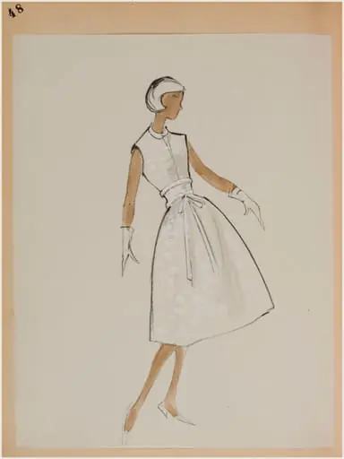Robe sans manches blanche avec ceinture nouée à la taille