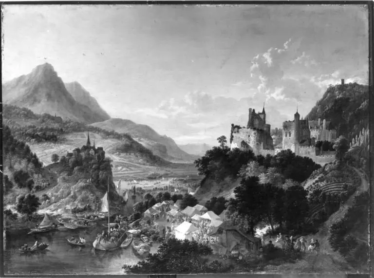 Mountainous river valley with a fair