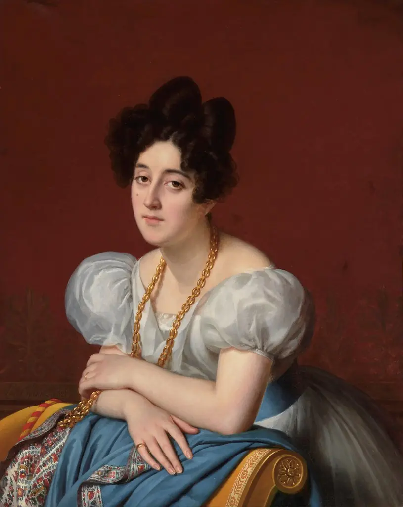 Portrait of a young woman leaning on a meridienne