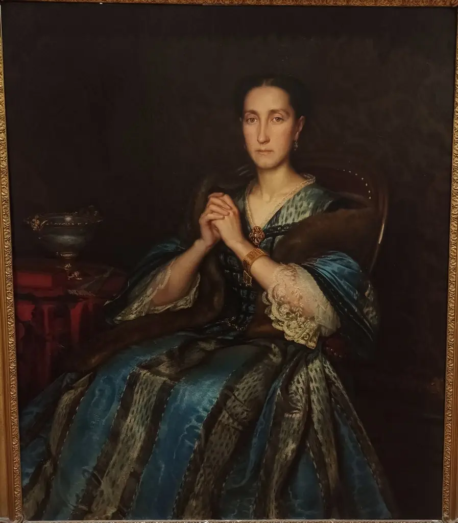 Adéle Mouton, épouse de l'artiste, en robe bleue