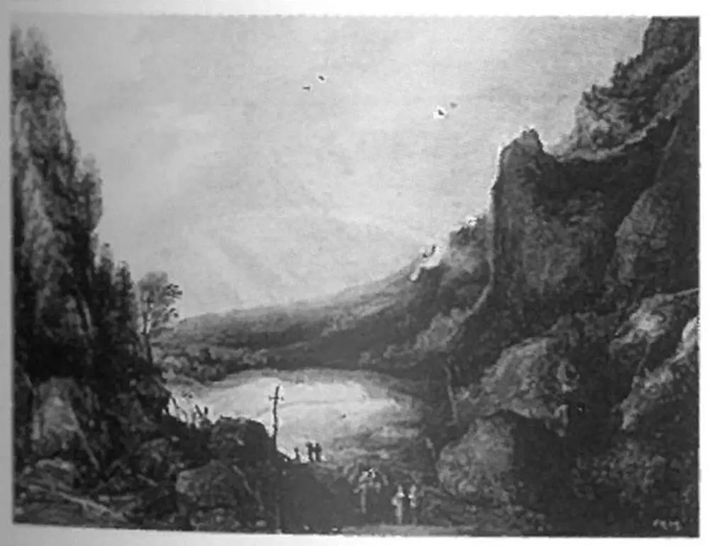 Mountainous landscape with valley and rainbow