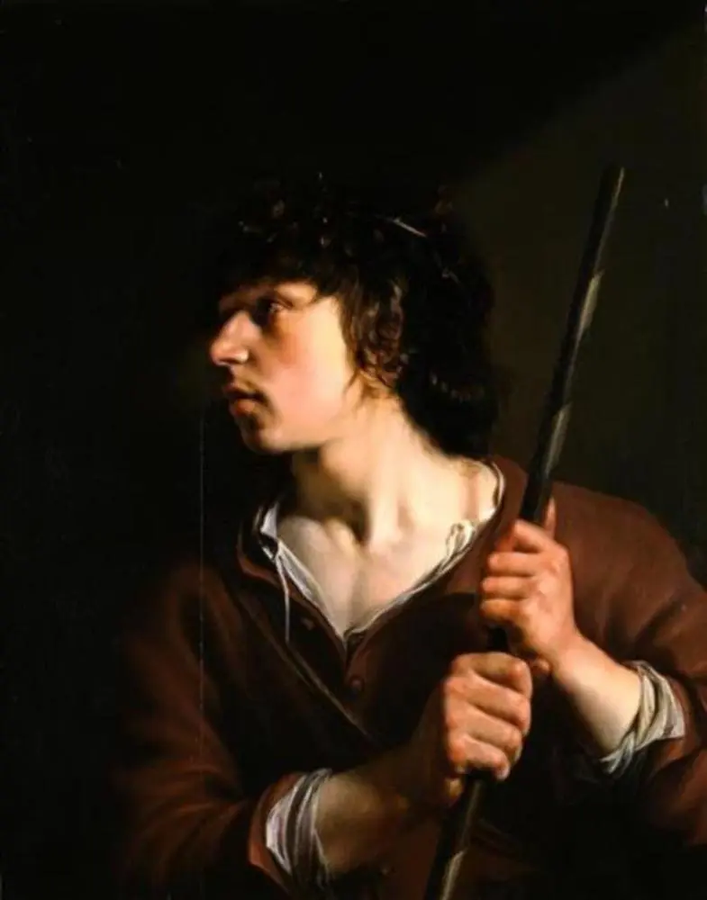 Young man with a wreath on the head