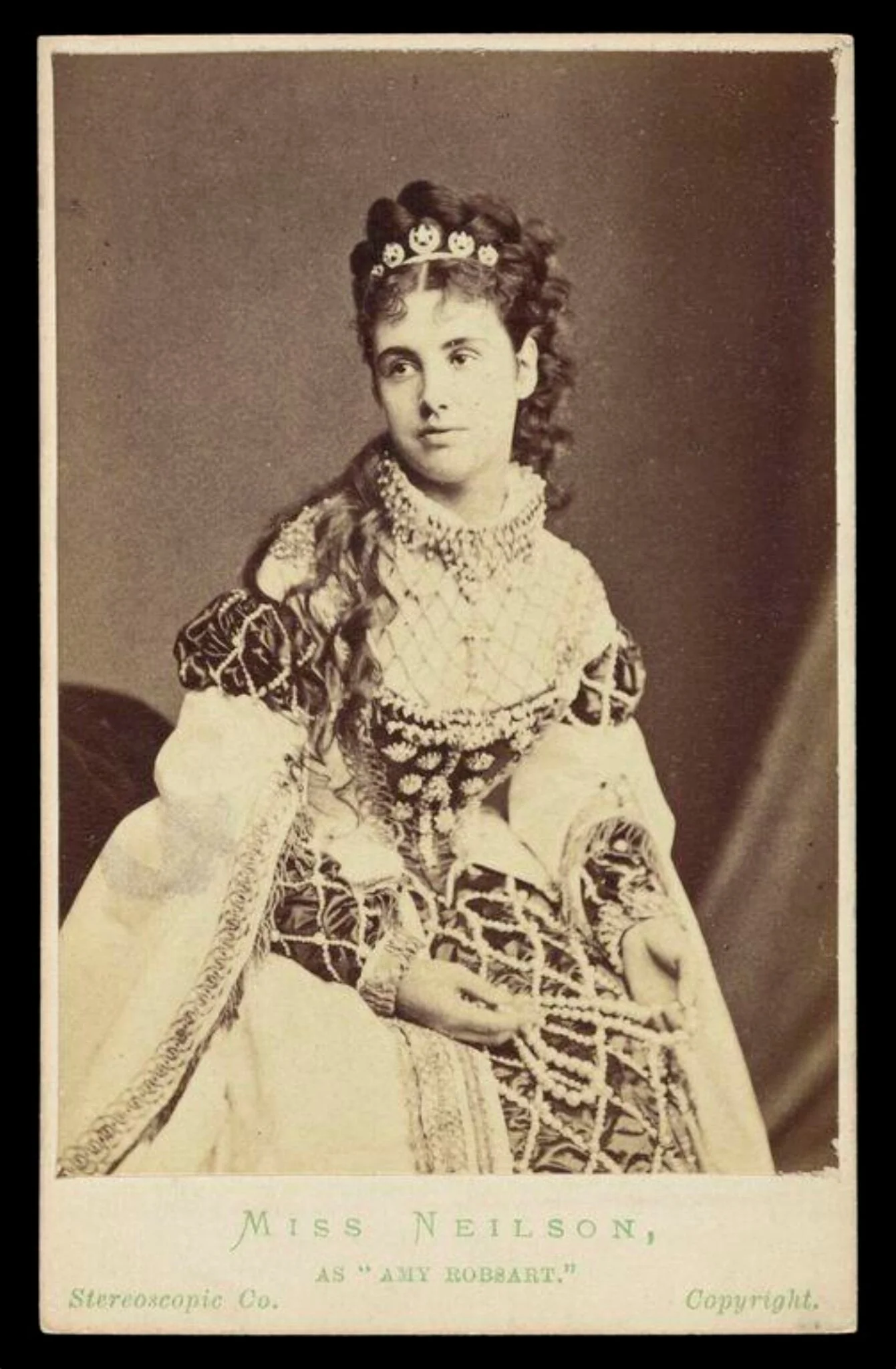 A portrait of 'Miss Neilson, as "Amy Robsart"', by London Stereoscopic and Photographic Company, photographic, 1875