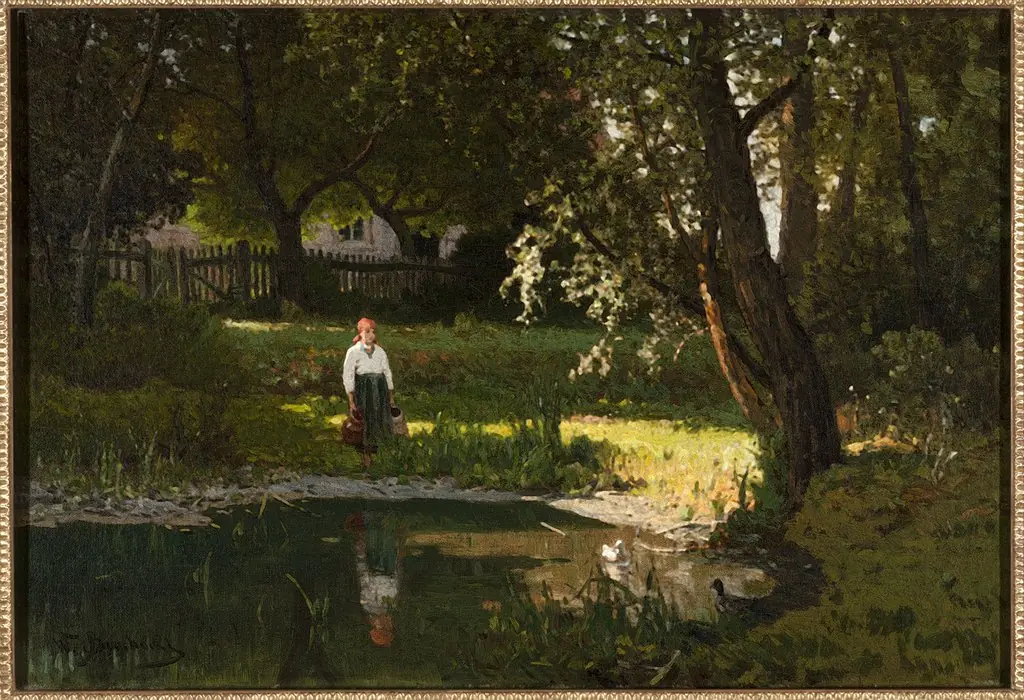 Girl at a pond