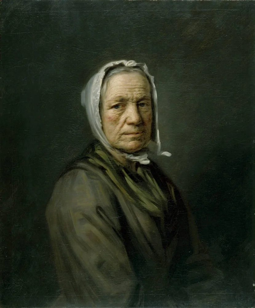Bejahrte Frau mit weißer Haube