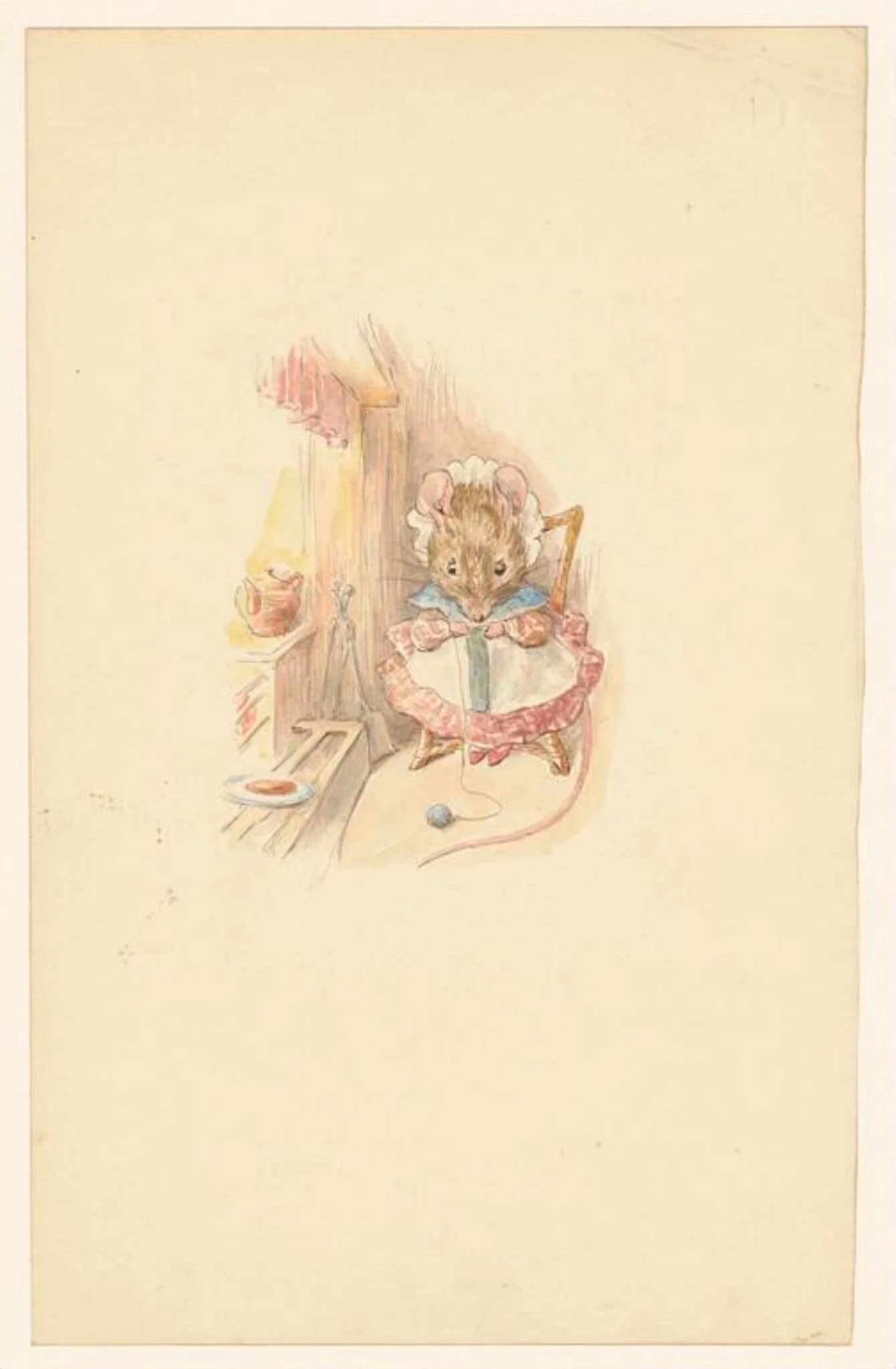 A mouse knitting