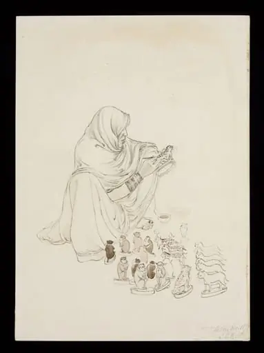 A seated woman painting spots on a toy leopard