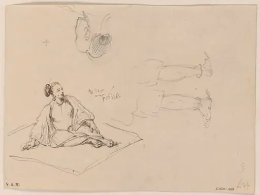 A Chinese woman seated on a mat