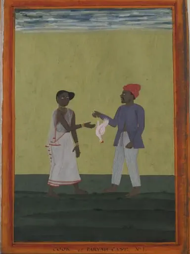 A cook holding a chicken