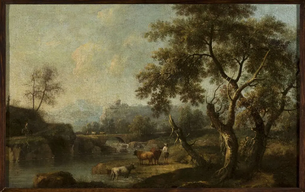 Mountain landscape with cattle at the waterhole