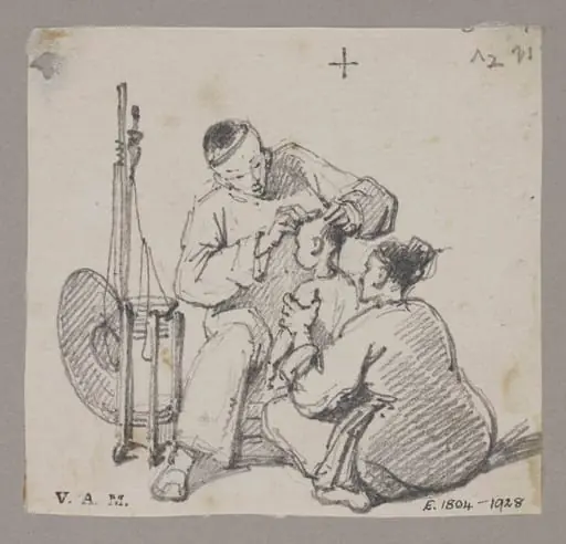 A barber shaving the head of a child