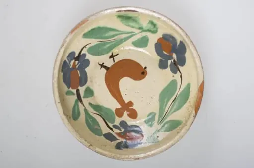 Blidul de formă tronconică este adânc, smălțuit (la interior). Vasul este ornamentat cu motive florale și avimorfe, cu buza înaltă, neornamentat și nesmălțuit la exterior. Cromatică: fond: maro-roșcat (exterior); alb (interior); decor: verde; maro; albastru; negru.