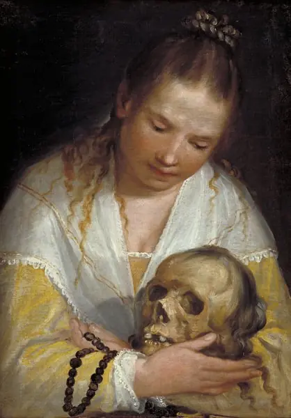 A Young Woman Contemplating a Skull