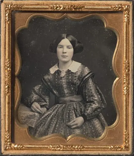 Young Woman in a Patterned Dress