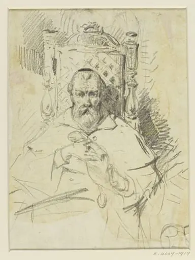 An old man seated in a chair