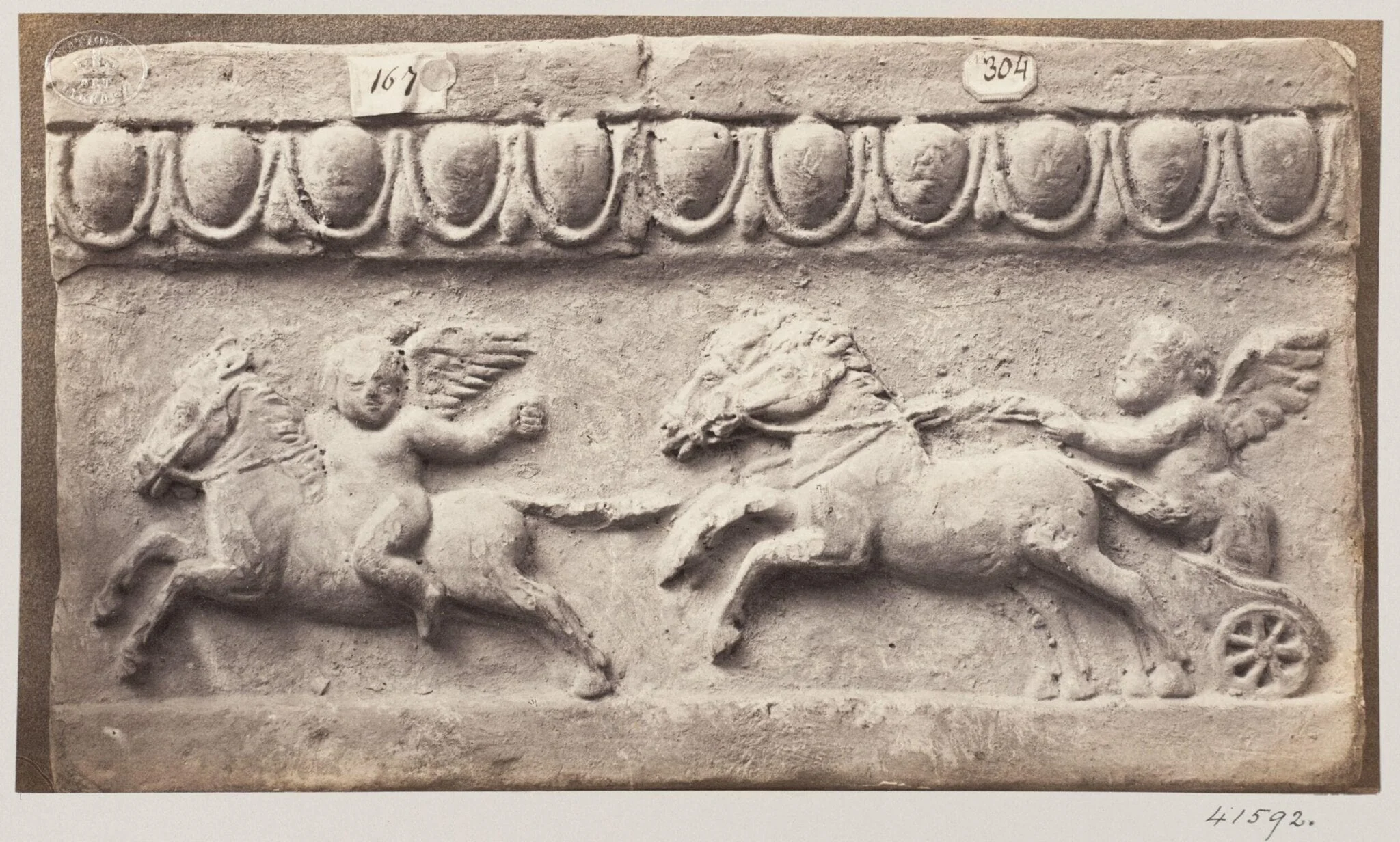 Bas-relief of a portion of a frieze in terra cotta depicting winged cupids and chariot and horses, by Louise Laffon, photographic, 1864