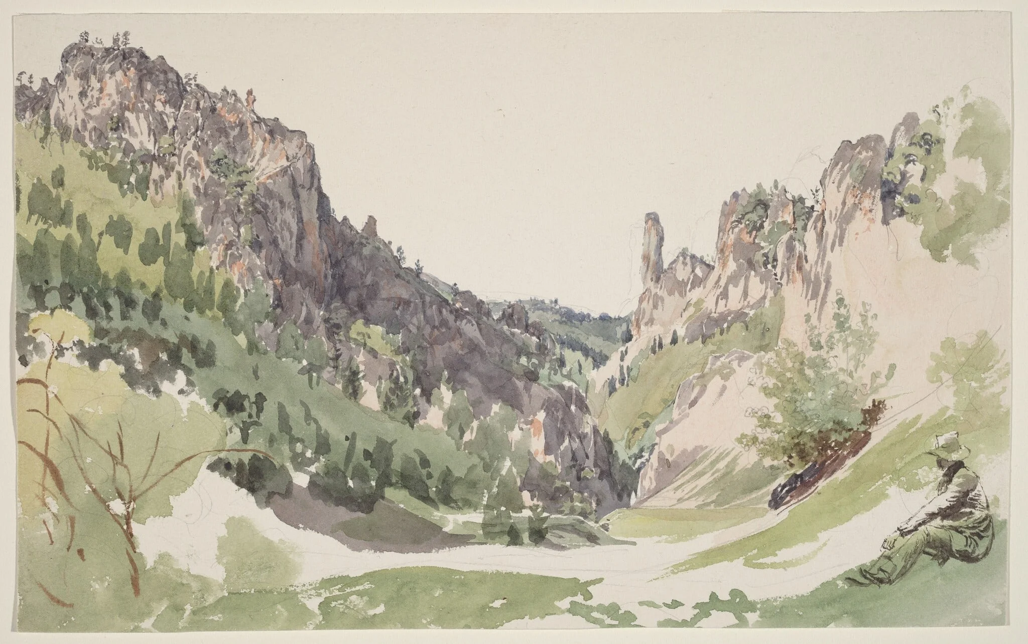 A Seated Man Contemplating a Sunlit Mountain Valley