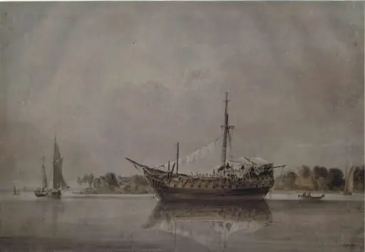 Dismantled vessel lying at anchor off a low point of land
