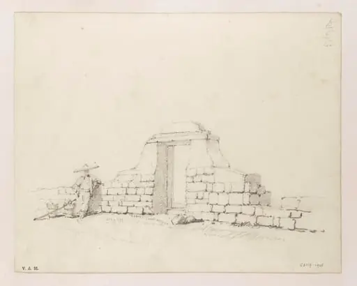 A Chinese figure by a doorway in a stone wall