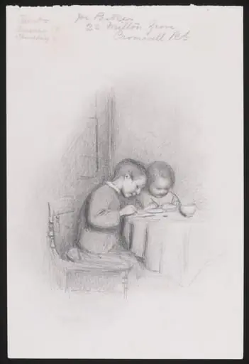 Two children seated at a table