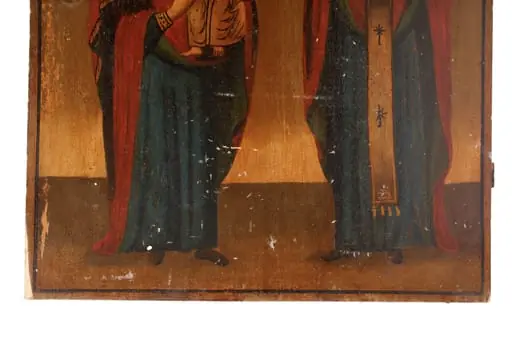 Icoană pictată pe lemn reprezentând pe Fecioara Maria cu Iisus în brațe și pe Sf. Neculai. Pe fond maro este prezentată Fecioara Maria în picioare ușor întoarsă spre dreapta, cu Pruncul pe brațul stâng, și Sfântul Nicolae în picioare, față, binecuvântând cu dreapta, iar cu stânga ținând Evanghelia. Atât Maria, cât și Nicolae poartă peste veșminte verzi-albastre mantii roșii. Carnația, nimburile, veșmintele lui Iisus, Evanghelia, omoforul sunt tratate în tonalități de ocru apropiat de maroul fondului.