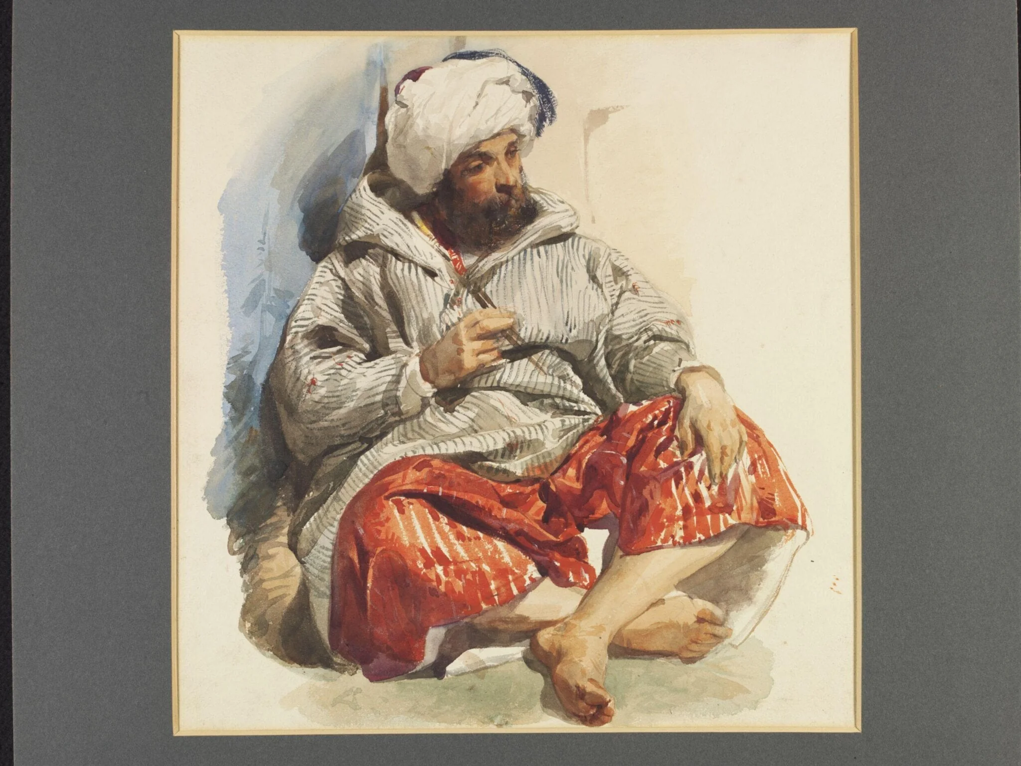 A European in Oriental dress, seated cross legged