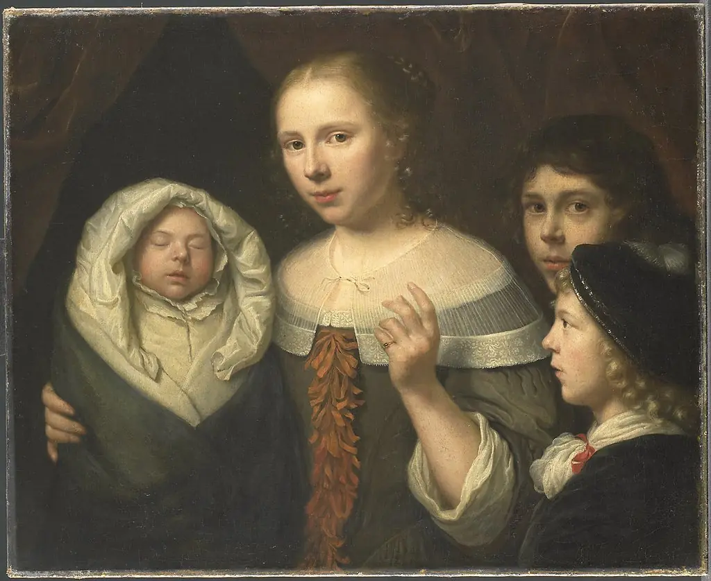 Portrait of a young woman with three children