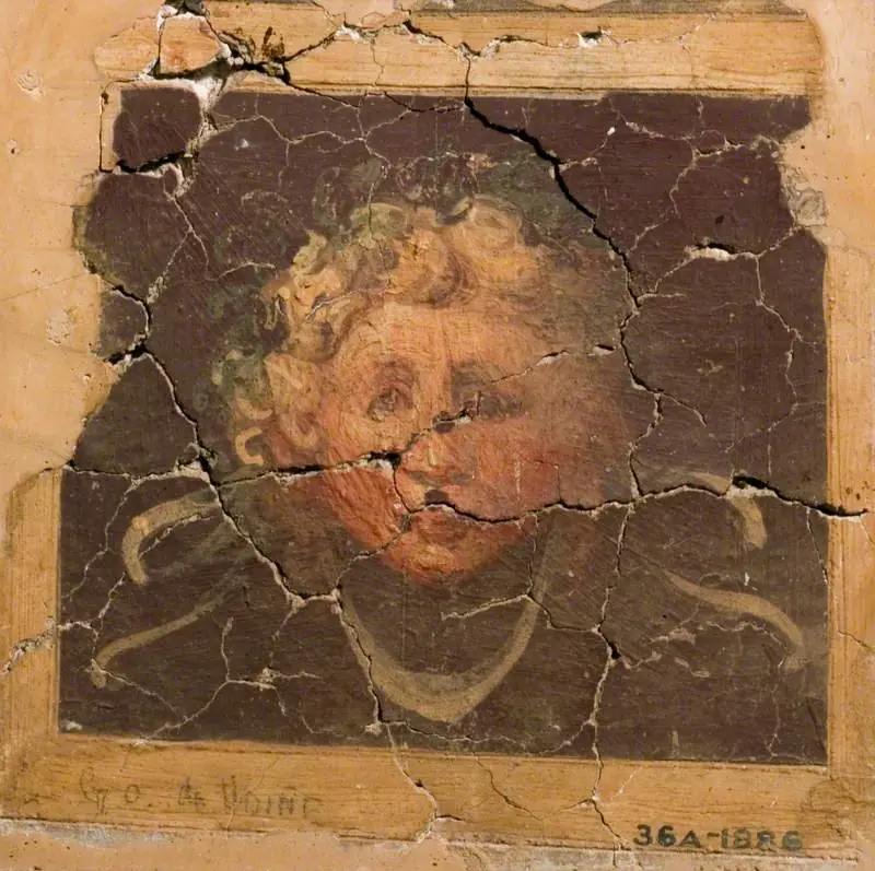 Female Head Framed by a Pattern of Ribbons (fragment of a wall decoration)