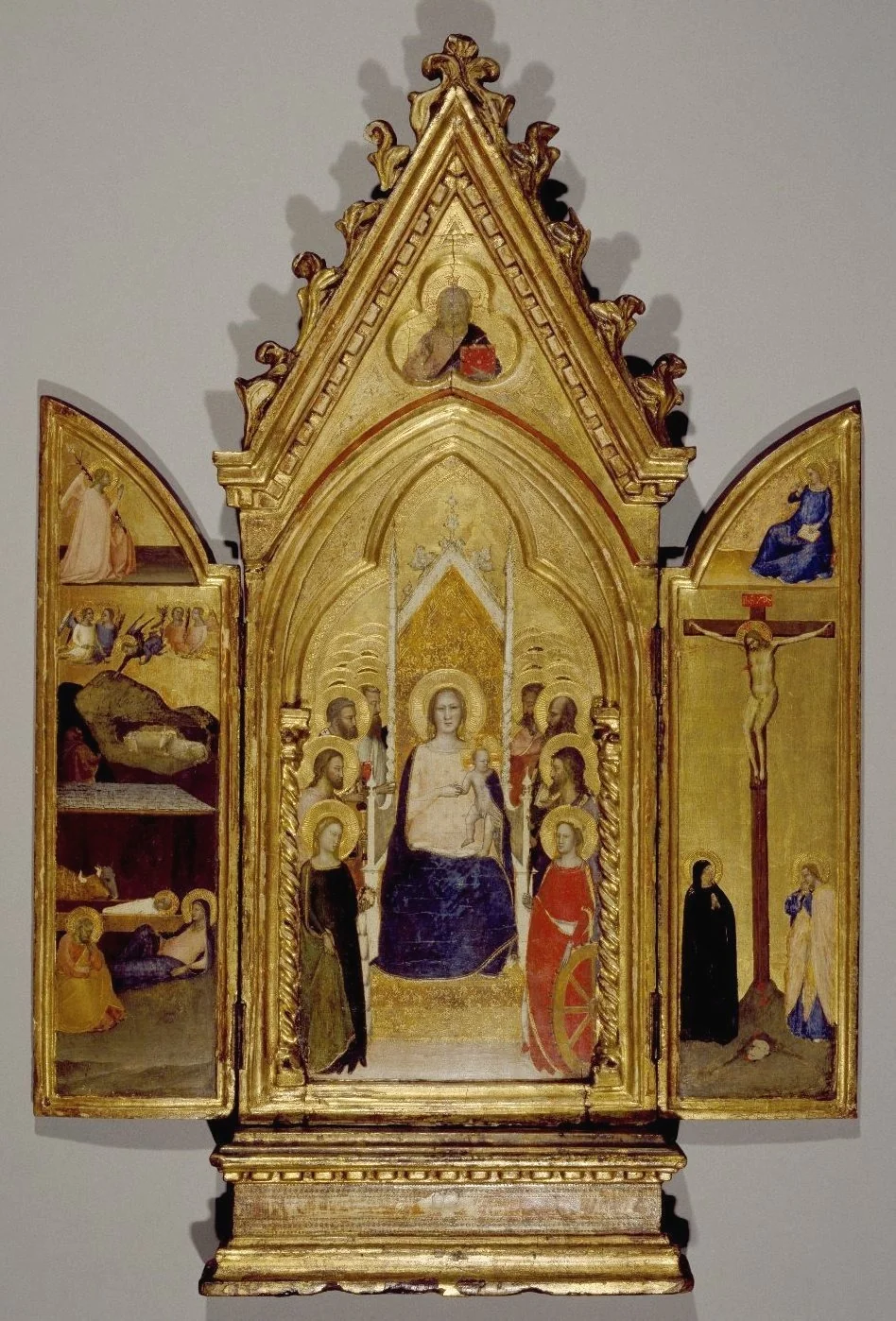 Triptych: Madonna with Saints and Christ Blessing (Center); The Nativity and the Annunciate Angel (Left Wing); Crucifixion and the Virgin Annunciate (Right Wing)