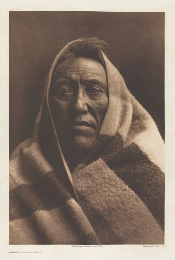 Portfolio VI, Plate 202: Middle Calf - Piegan, by Edward S. Curtis, 1900