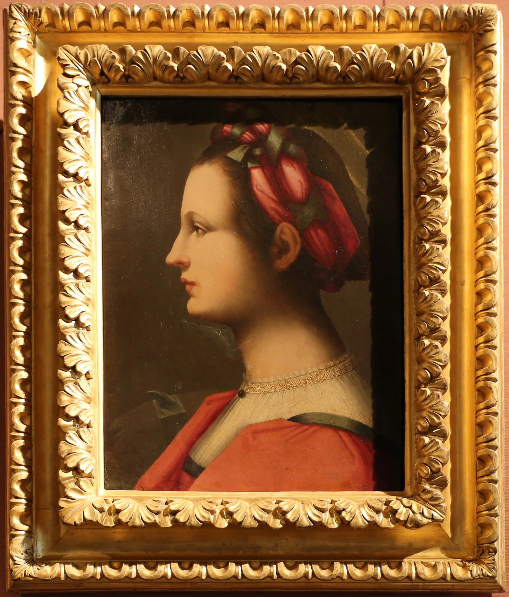 Portrait of a young woman as Saint Catherine of Alexandria, by Andrea del Brescianino, oil, 1600