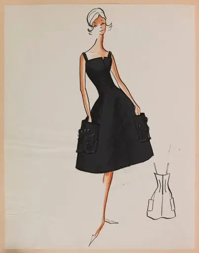 Robe noire à bretelles et deux larges poches brodées sur la jupe