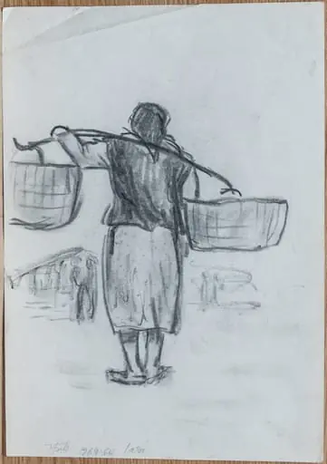Femeie cărând poveri