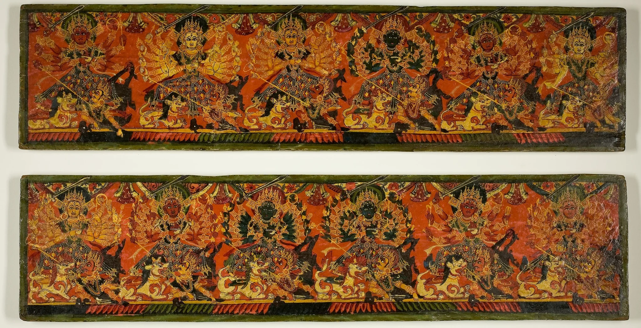 Pair of Manuscript Covers with Twelve Durgas on Snow Lions Slaying the Buffalo Demon (Mahishasuramardini)