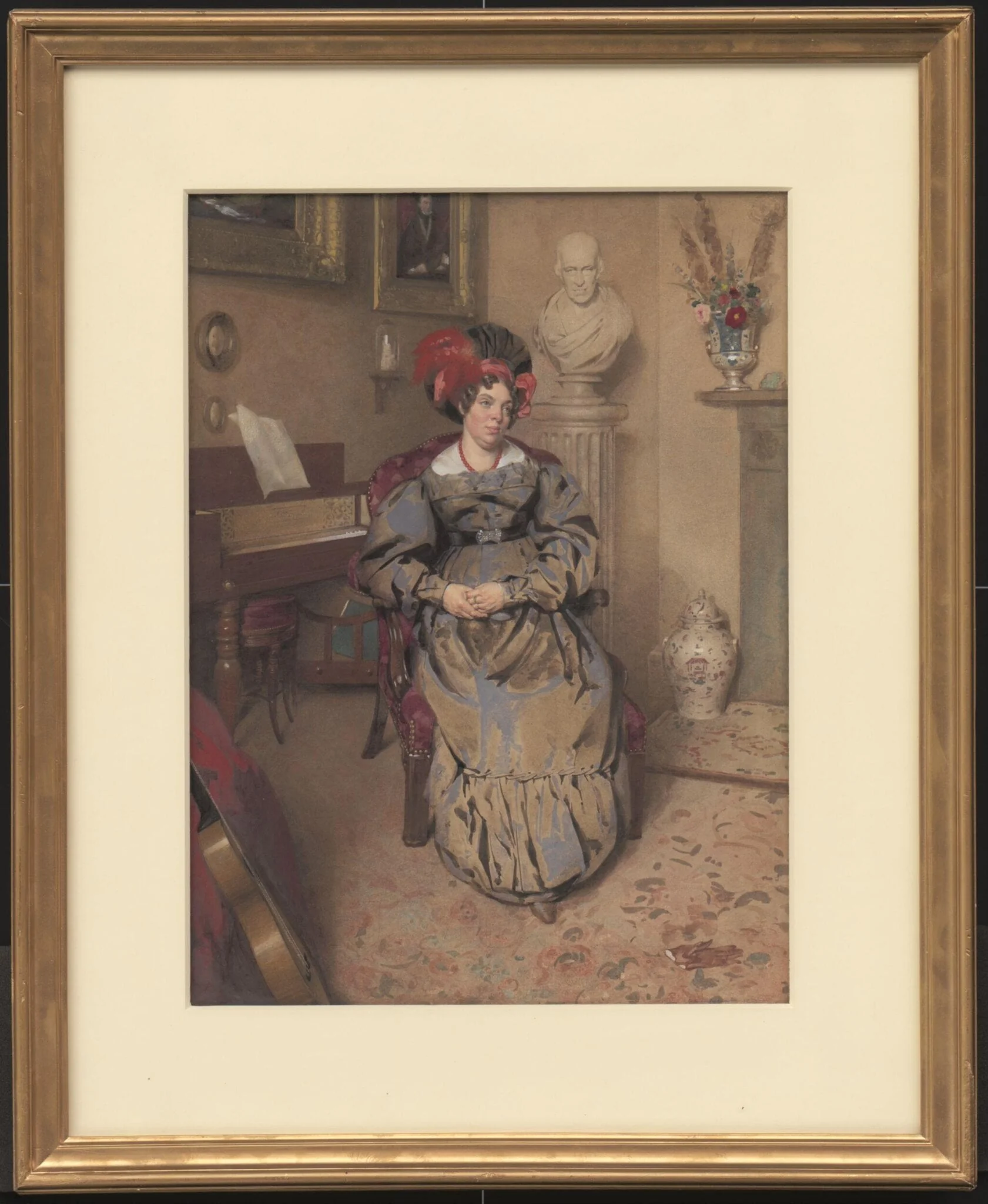 Portrait of a lady seated in an armchair