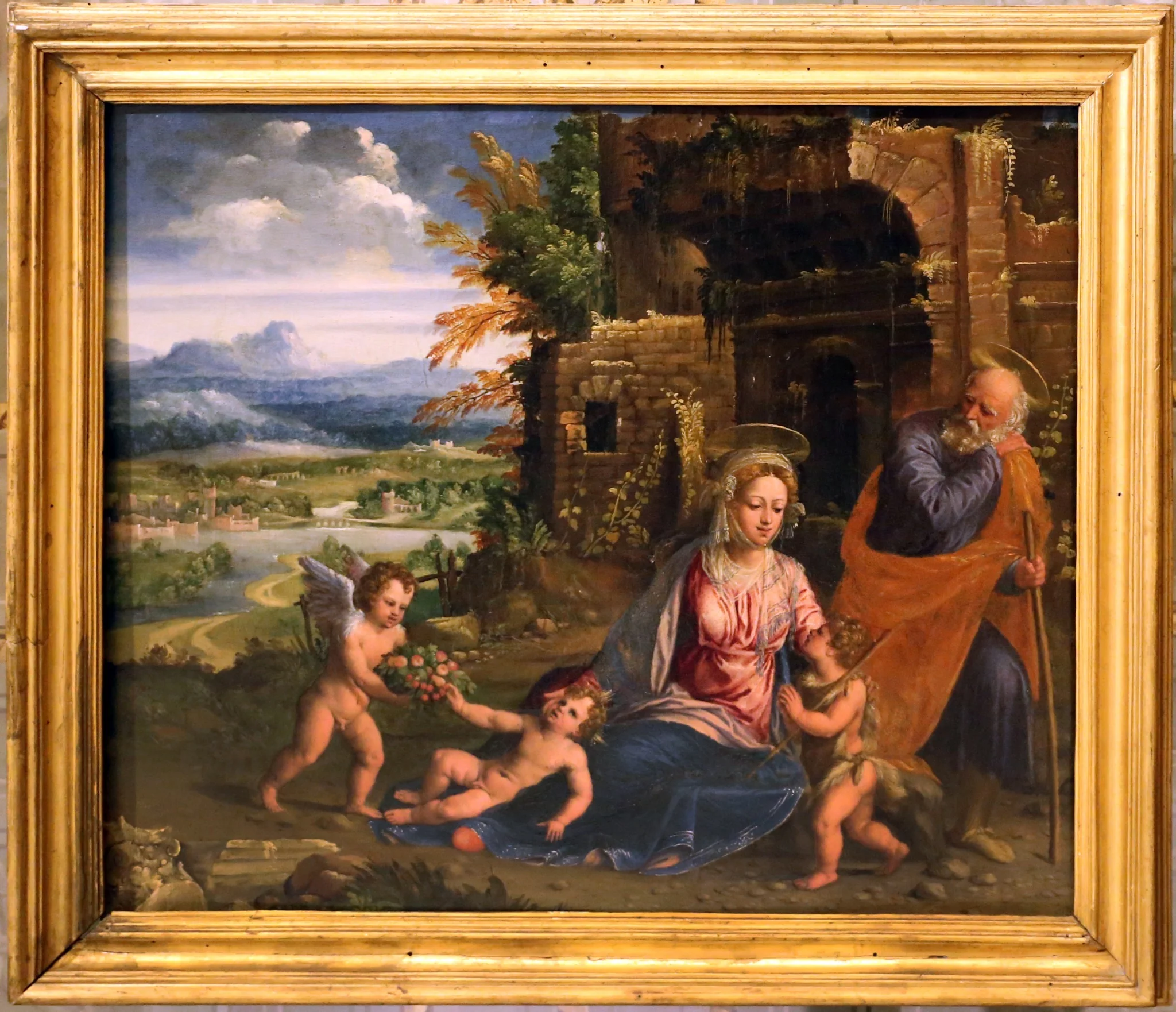 Holy Family with St. John and Angels, by Battista Dossi, oil, 1510