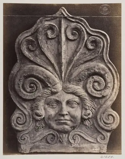 Bas-relief antifixa of a gorgon in terra cotta