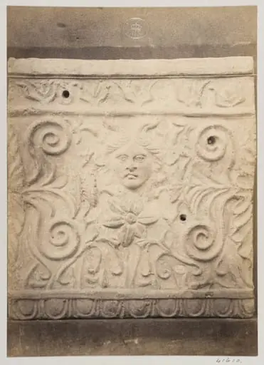 Bas-relief portion of a frieze with a mask in terra cotta