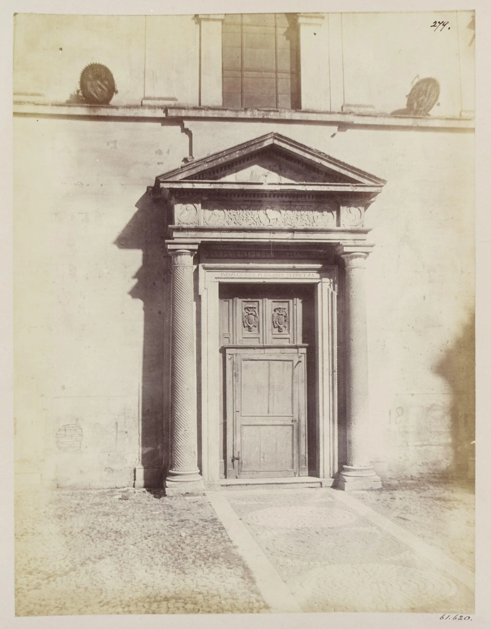 Church of S. Pudentina. Doorway, with shallow Sculpture of the eighth century (?), over it the Doorway rebuilt in the seventeenth century., by John Henry Parker, photographic, 1866