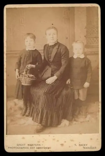 Portrait of a woman and two children