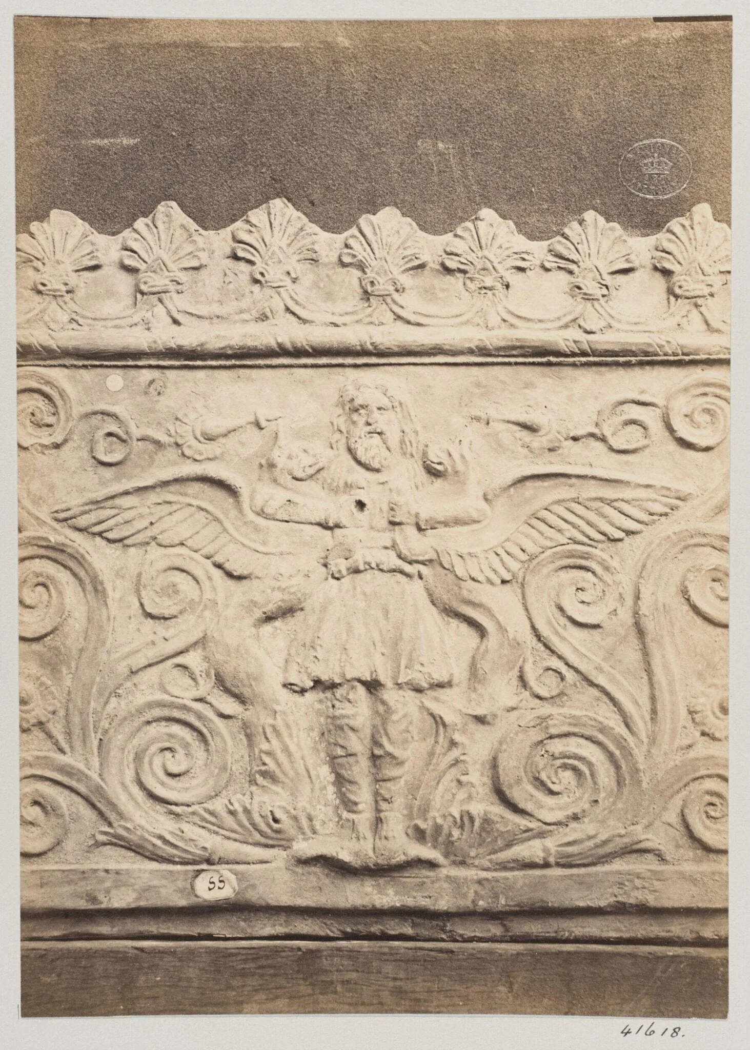 Bas-relief portion of a frieze of a flying genie in terra cotta, by Louise Laffon, photographic, 1864
