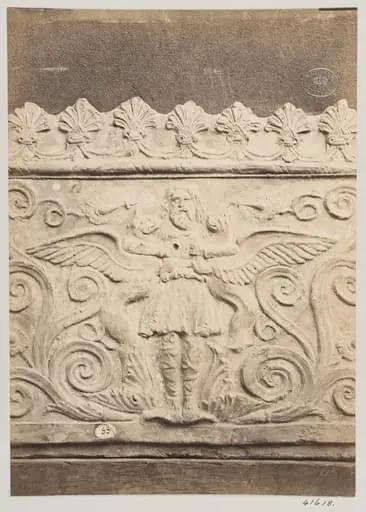 Bas-relief portion of a frieze of a flying genie in terra cotta