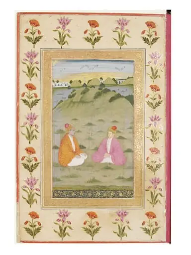 two men seated in a landscape