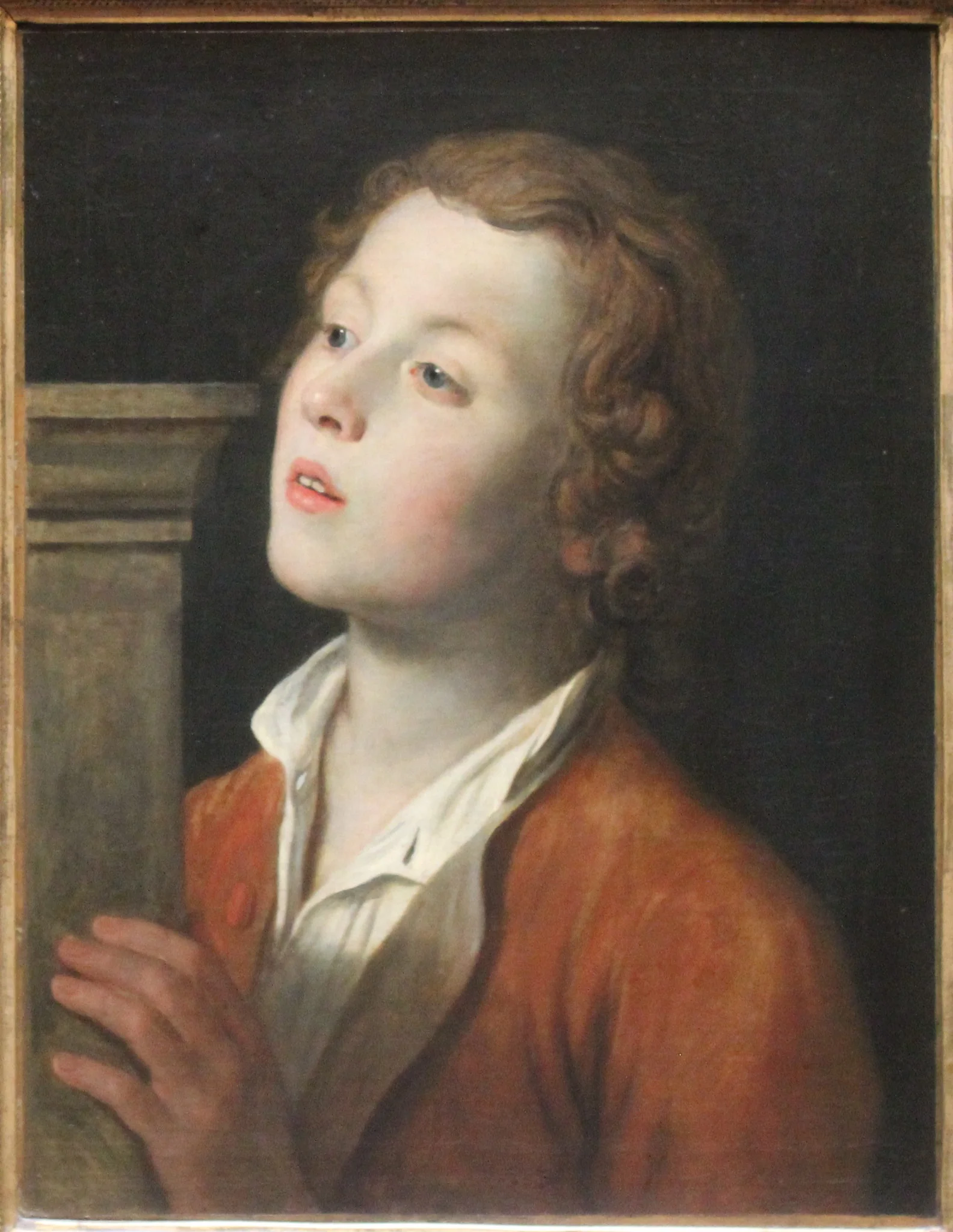 Boy on a pedestal