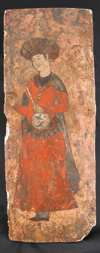 Man Holding a Bottle and a Cup