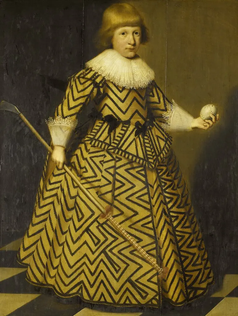 Portrait of a boy with a kolf club