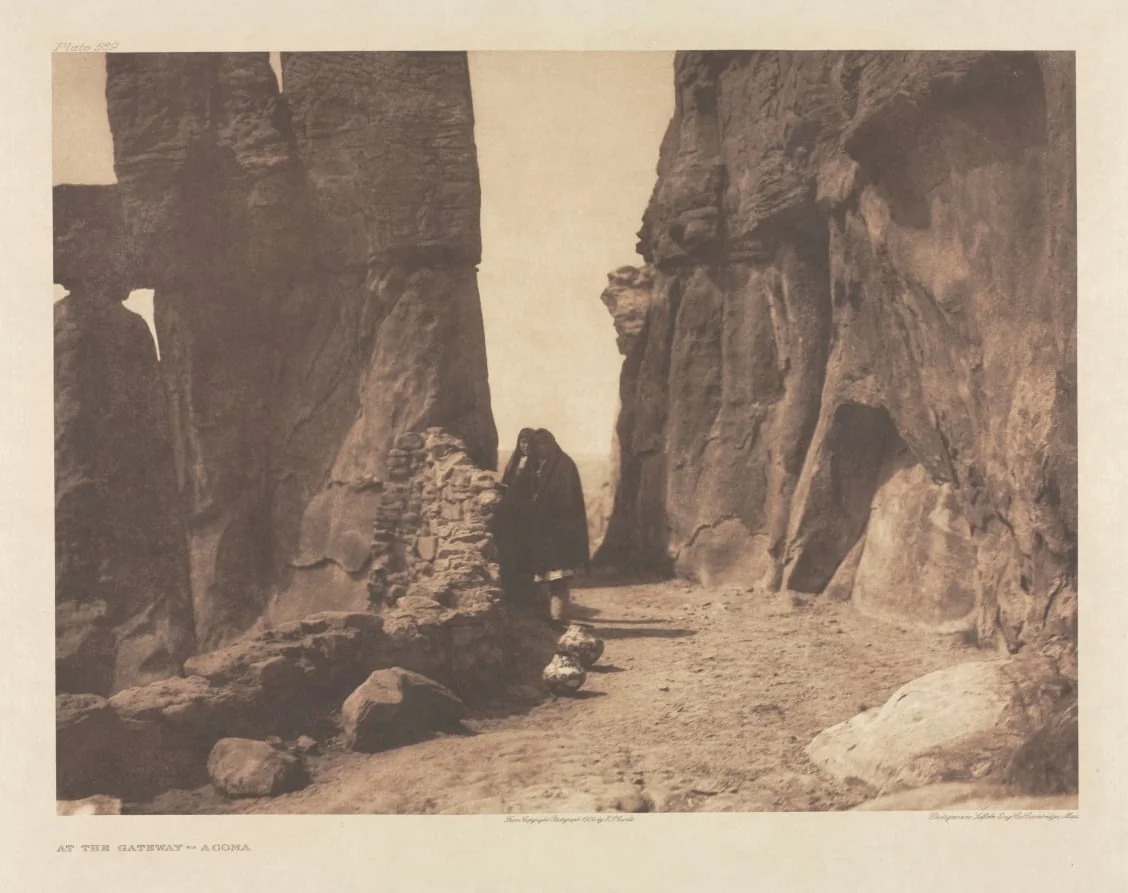 Portfolio XVI, Plate 569: At the Gateway - Acoma, by Edward S. Curtis, 1904
