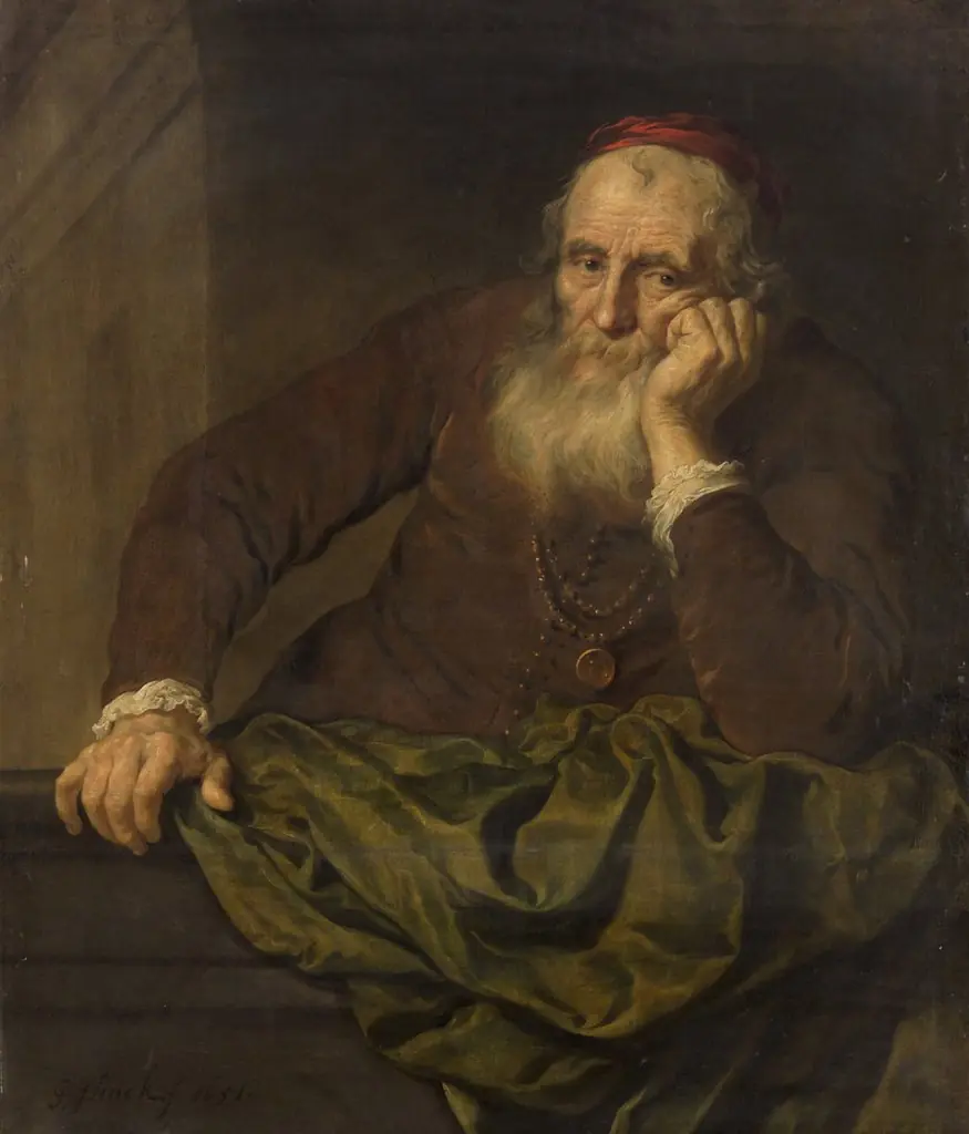 Old man leaning on a balustrade